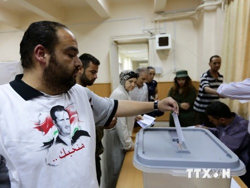 Syrians begin to vote in presidential election - ảnh 1